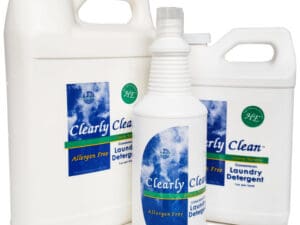 A group of white bottles with the words " clearly clean " on them.