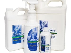 A group of cleaning products that are all white.